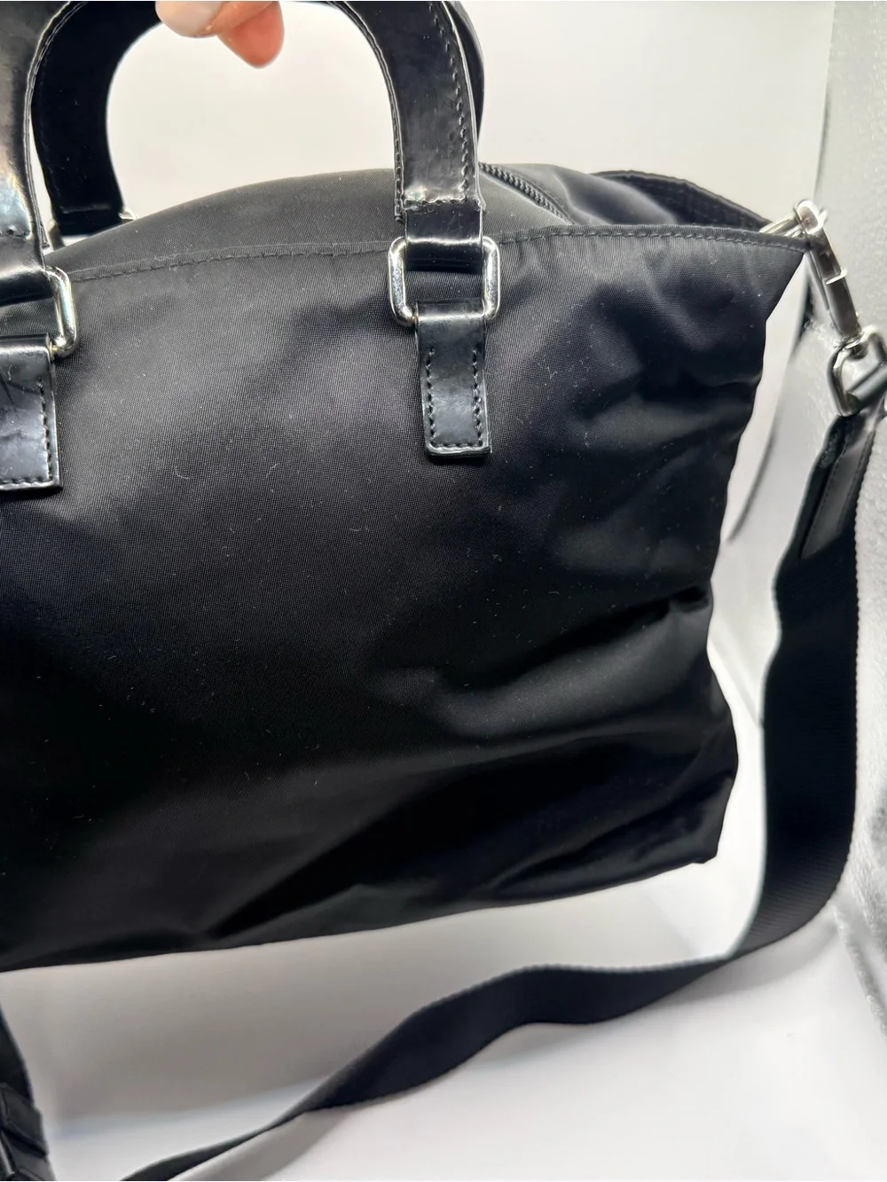 Prada Black Nylon & Leather Bag with Embossed Prada logo.